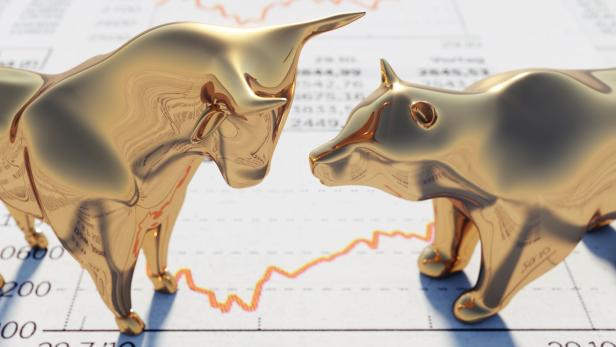 Bull and Bear on financial Newspaper